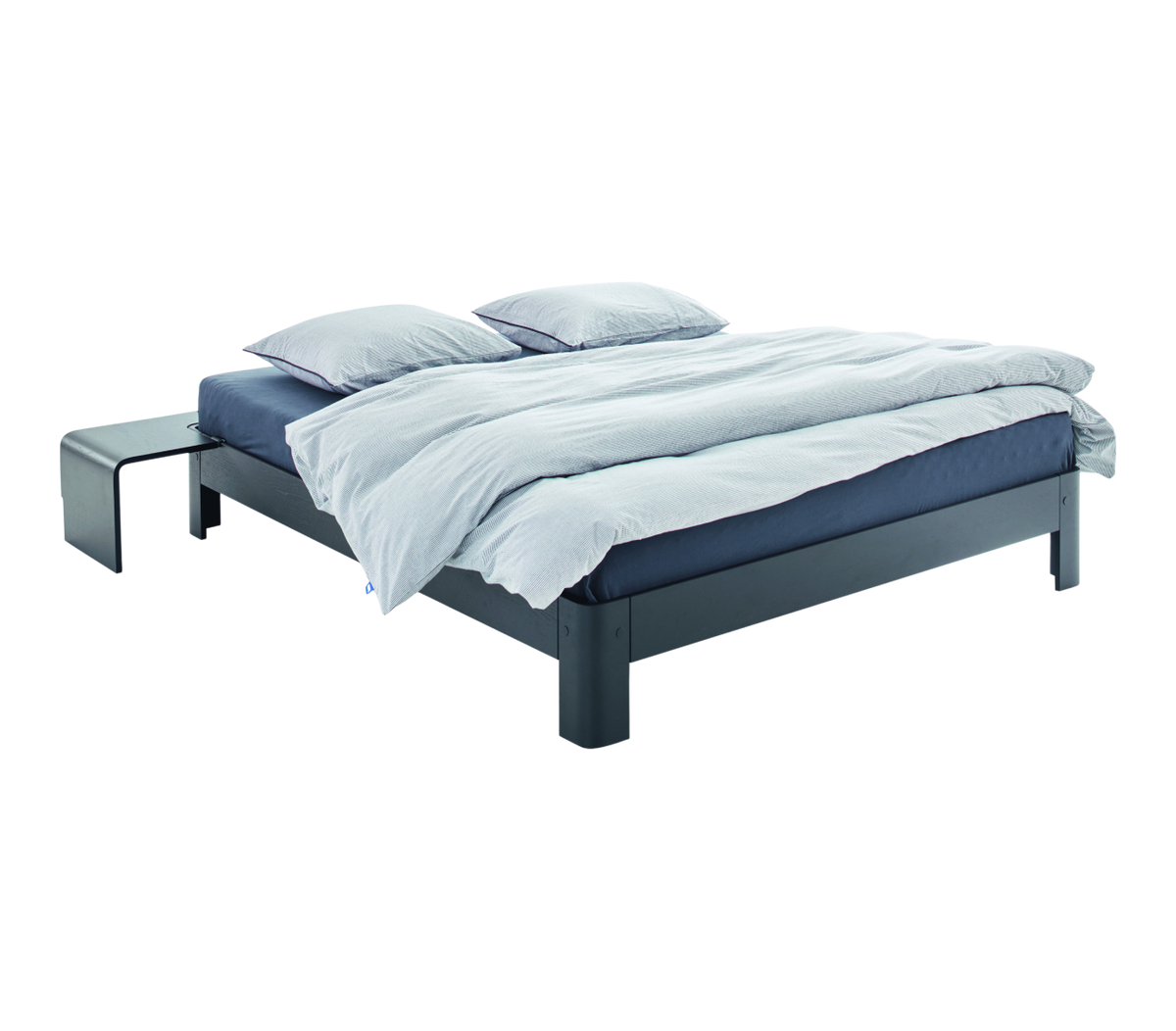 Bed with gray frame and white bedding on a white background