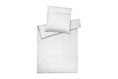 White bedding pillow set with Greek patterns on a white background