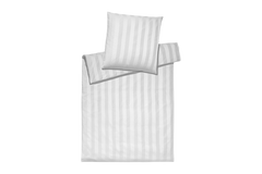 Striped bedding set with a pillow on a white background