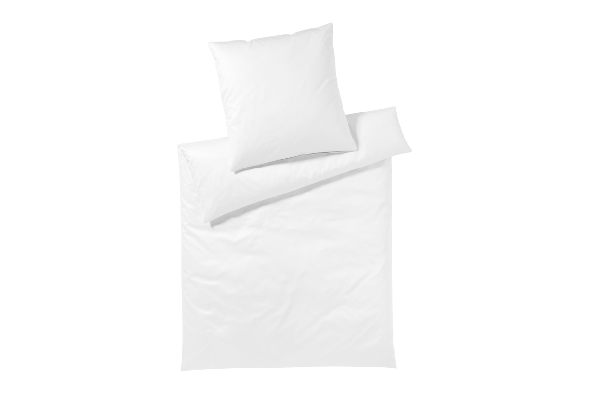 White bedding set with duvet and pillow on a white background