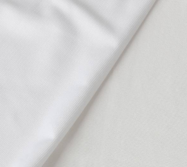 Close-up of white fabric with a subtle texture