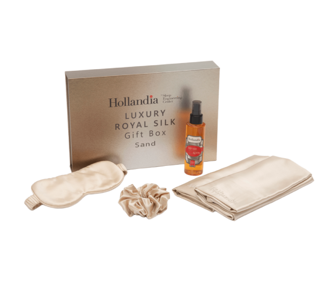Hollandia Luxury Royal Silk gift set with a box, eye mask, scrub, and oil on a white background.