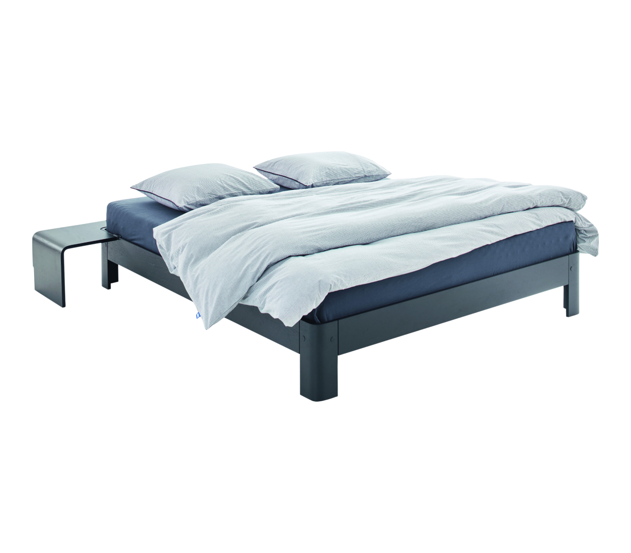 Bed with gray frame and white bedding on a white background