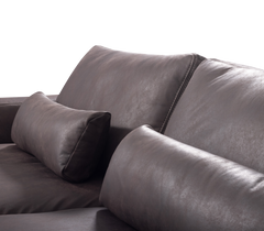 Gray sofa with cushions on a white background