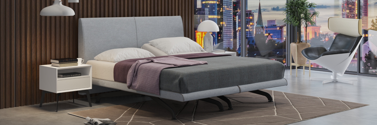 Modern bedroom with a Champion 4U bed, nightstands, and cityscape view