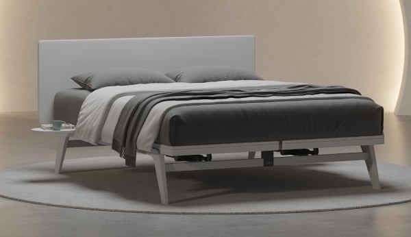 Modern bed with gray bedding in a minimalistic room