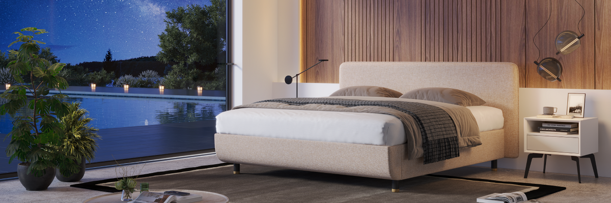 Modern bedroom with a bed, nightstands, and a view of a pool at night.