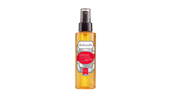 Spray bottle with a visible brand label on a white background