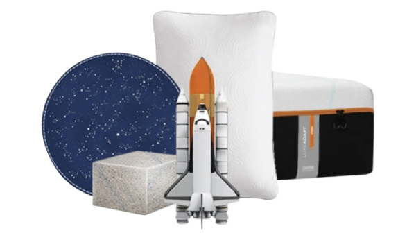 Space-themed decorative set with rocket model, planet, and moon on a white background