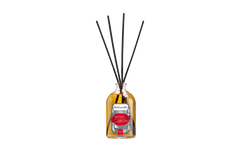 Reed diffuser with black sticks in a glass bottle on a white background